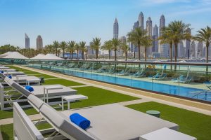 Pool and sunbeds at the Hilton Dubai Palm Jumeirah