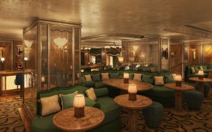 gold and blue interior with comfortable seating and low lighting in the vesper bar at The Dorchester