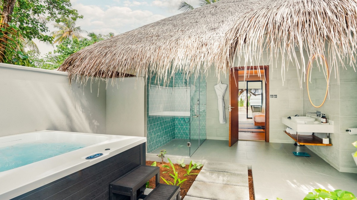 outdoor bathroom at a beach villa at Nova Maldives