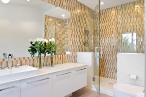 geometric patterns in the bathroom using TREND mosaic tiles in white and gold