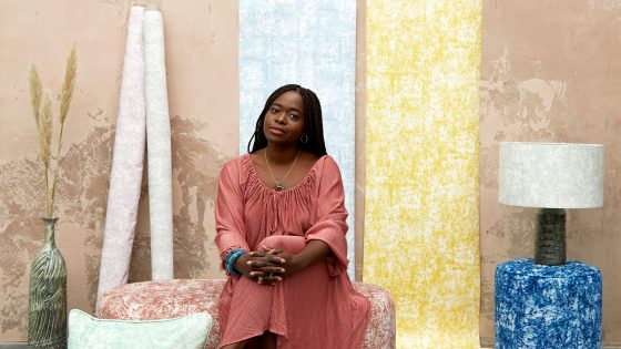 designer Eva Sonaike with fabrics from her Asa range