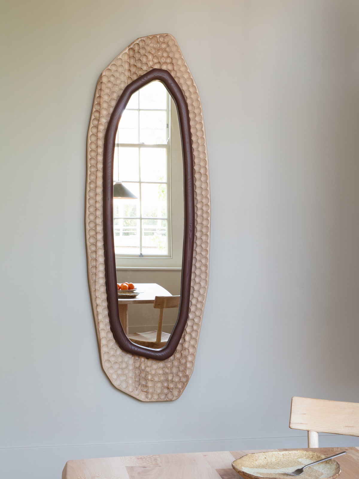organic and tactile wooden framed mirror