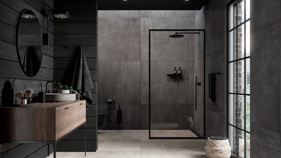 Unidrain fittings in an industrial style bathroom with black details