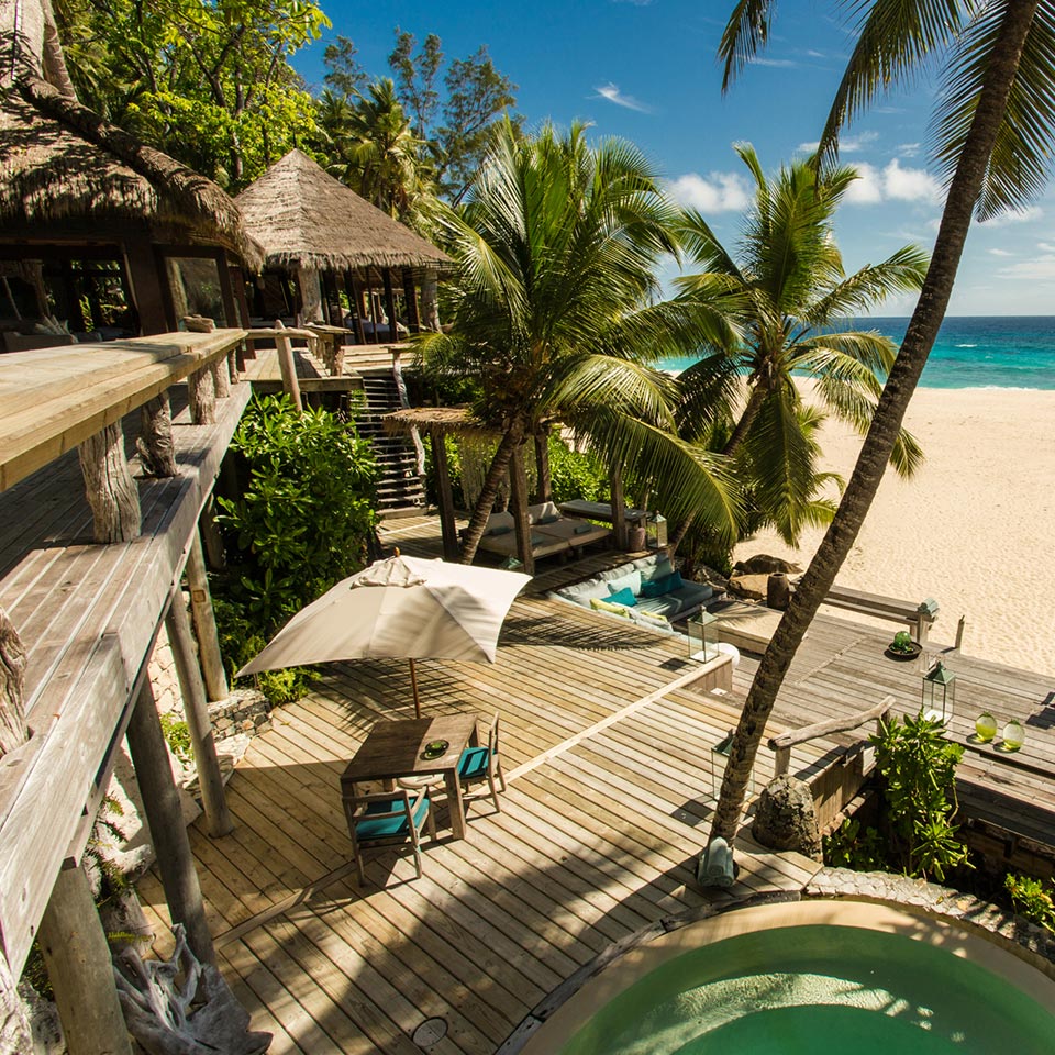 Tropical paradise: decking next to beach at Villa North