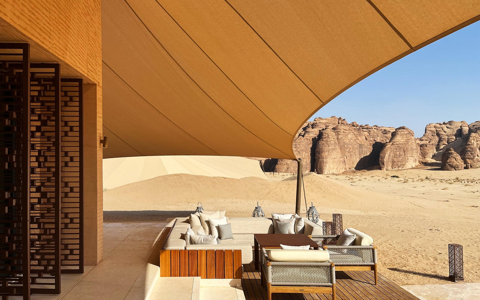 view from tented terrace across the desert at Banyan Tree Alula with design by AW2