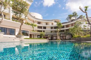 exterior view of the hotel and main swimming pool in the centre at Segara Bali