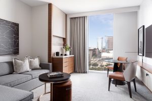 couch and table with views over Nashville in guestroom at Four Seasons Nashville