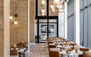 restaurant in Four Seasons Nashville with statement lighting and high volume ceiling