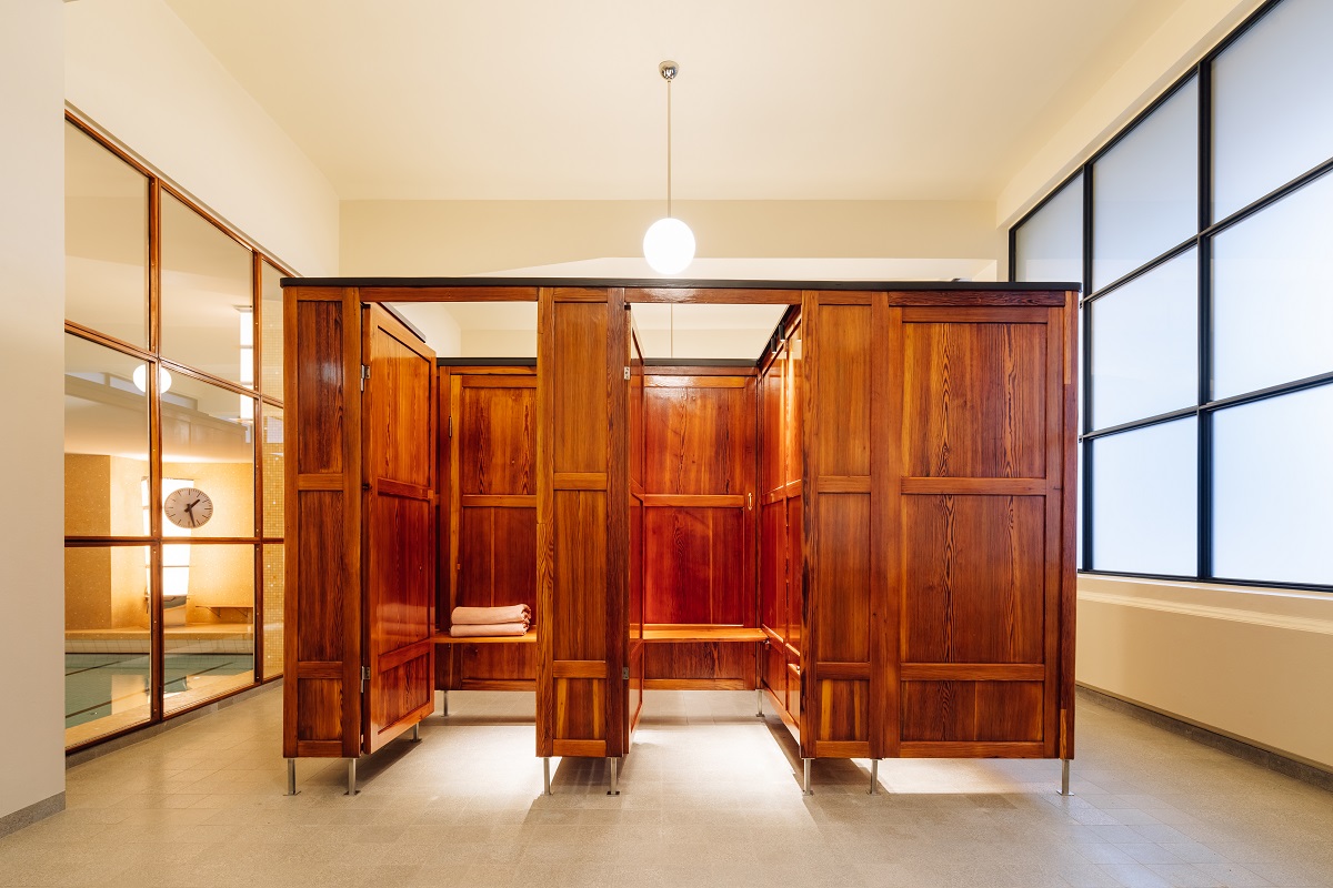 restored wooden cubicles in change rooms at the spa in Sommerro