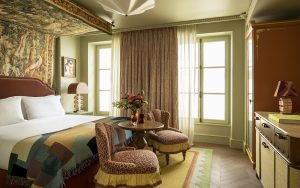 mixed pattern and colour in the guestroom of Le Grand Mazarin Paris