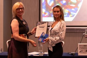 Jo Runagall presented NEWH award by Caroline Cundall
