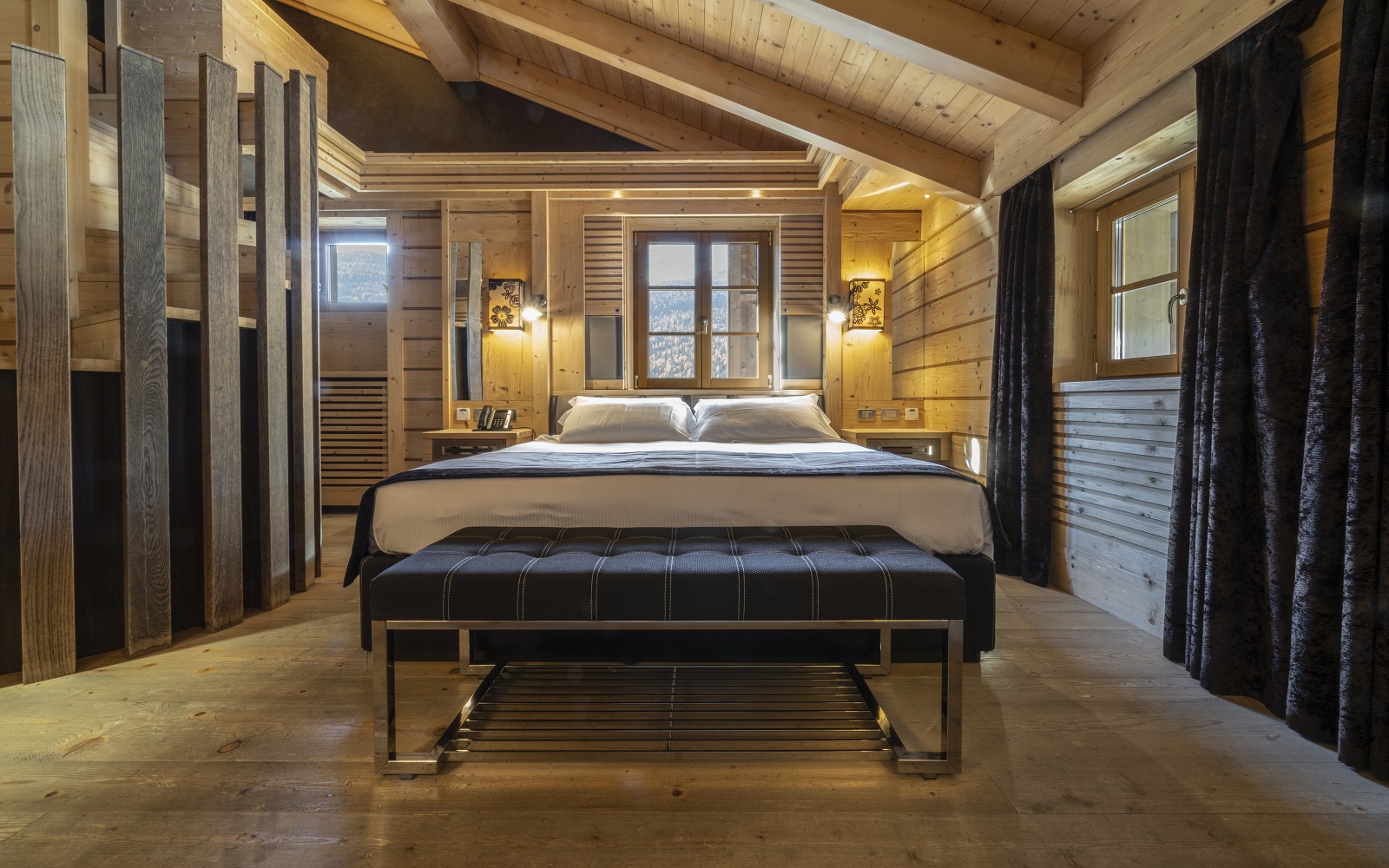 bedroom with warm wooden surfaces at Rosapetra Spa Resort
