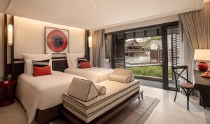 Deluxe guestroom overlooking swimming pool in Aleenta Retreat Chiang Mai 