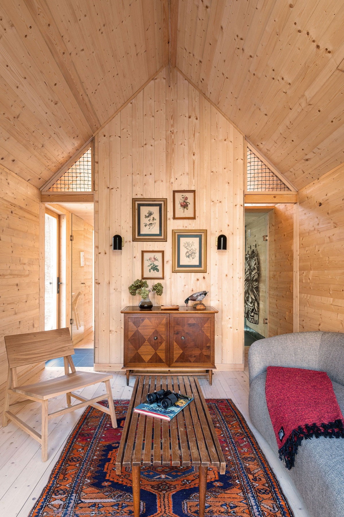 wooden scandi inspired walls and ceilings in the guestroom at Eastwind Oliverea Valley