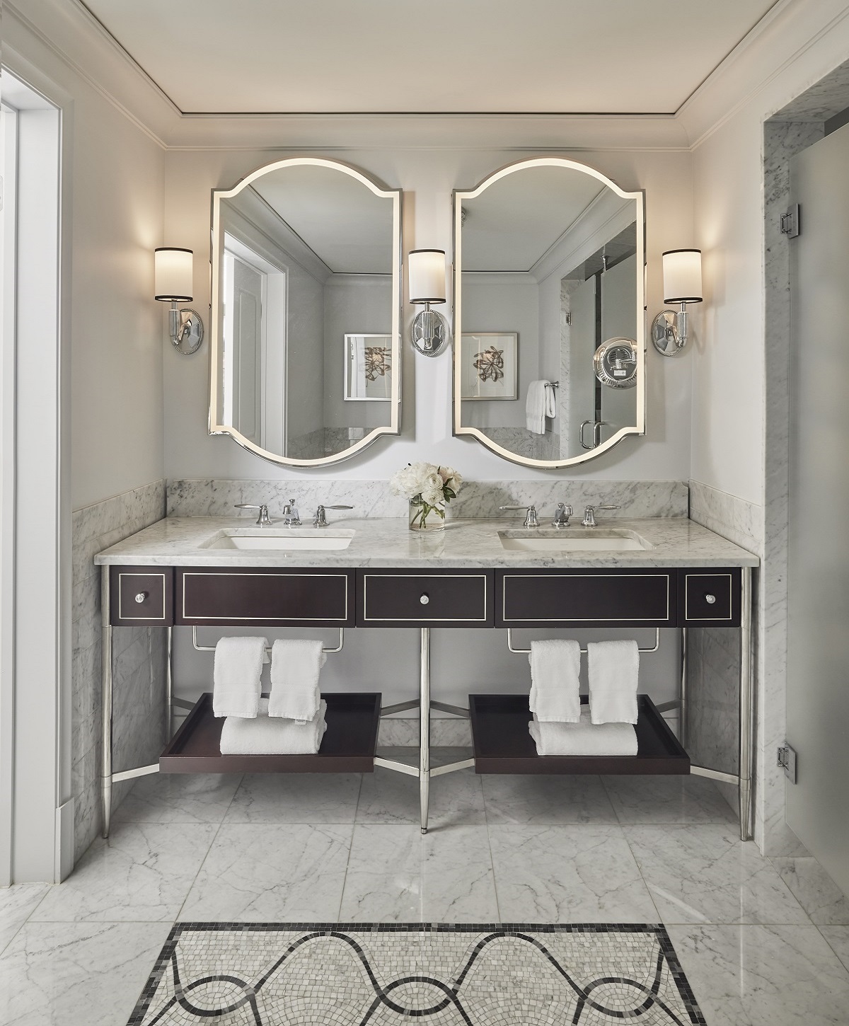 bathroom design in Waldorf Astoria in black and white by KTGY Simeone Deary Design Group