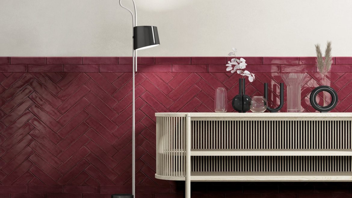 a tiled wall in red and pink tones in CTD’s Poitiers collection