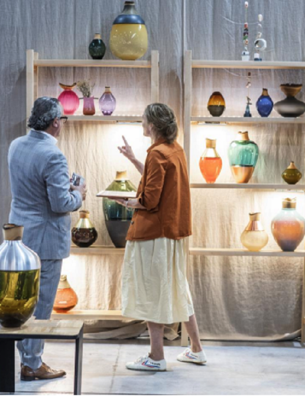 visitors at Maison&Objet with glassware on display