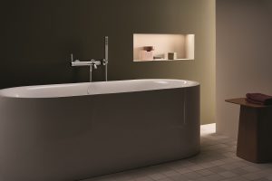 freestanding bath with Meta bathroom fittings in chrome by dornbracht