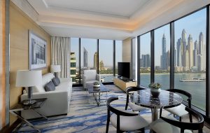 living room and seating in suite with sea views at Marriott Resort Palm Jumierah, Dubai