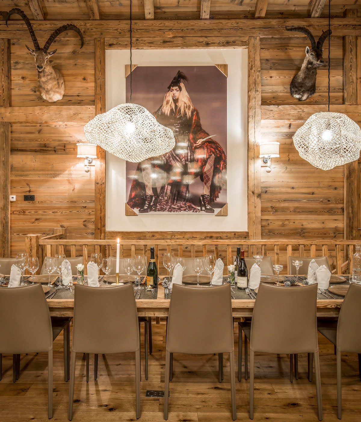 Modern fashion artwork commanding dining room in chalet
