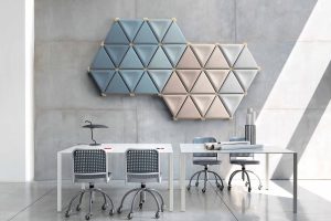 Mogu Accoustic tiles in pastel shades on a concrete wall - Mycelium Panels 