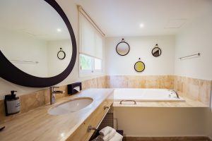 refurbished bathroom in Grand Palladium Jamaica guestroom with hydro massage bath