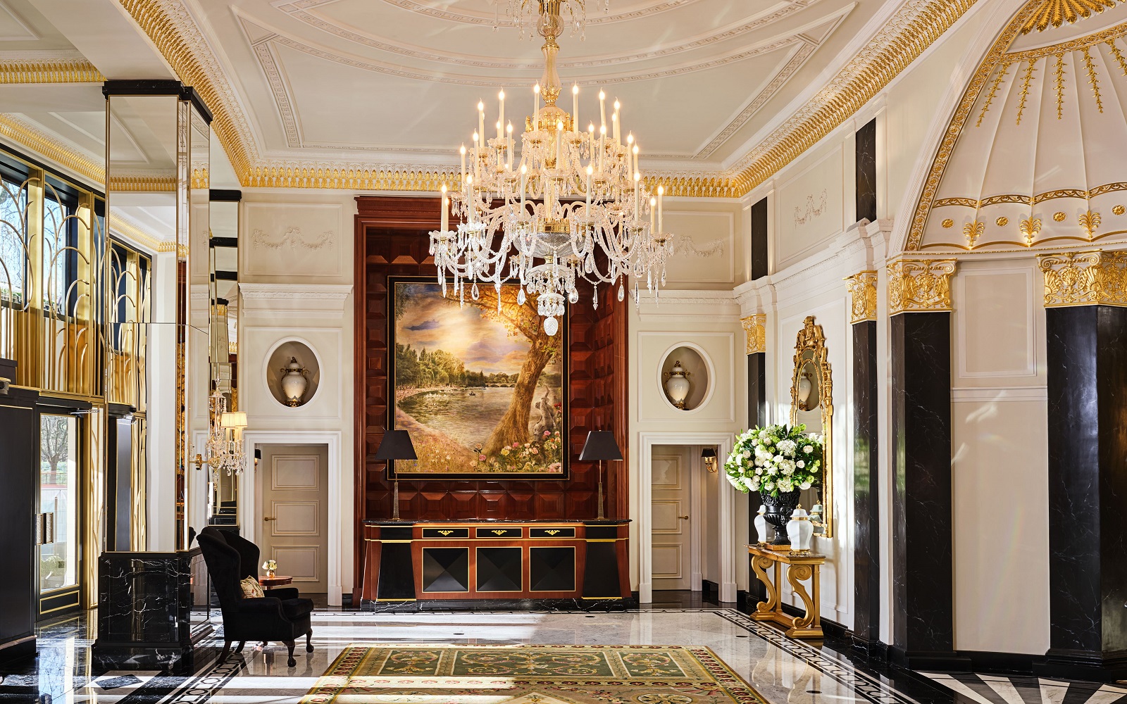 chandelier and marble surfaces in The Dorchester lobby