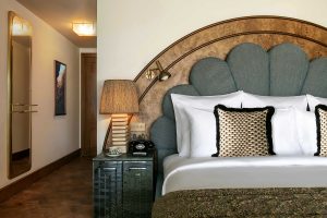 interior details of headboard and mirror surfaces in The Ned Doha Cosy Bedroom