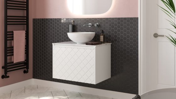 pink and black bathroom with Vergo fittings from Crosswater
