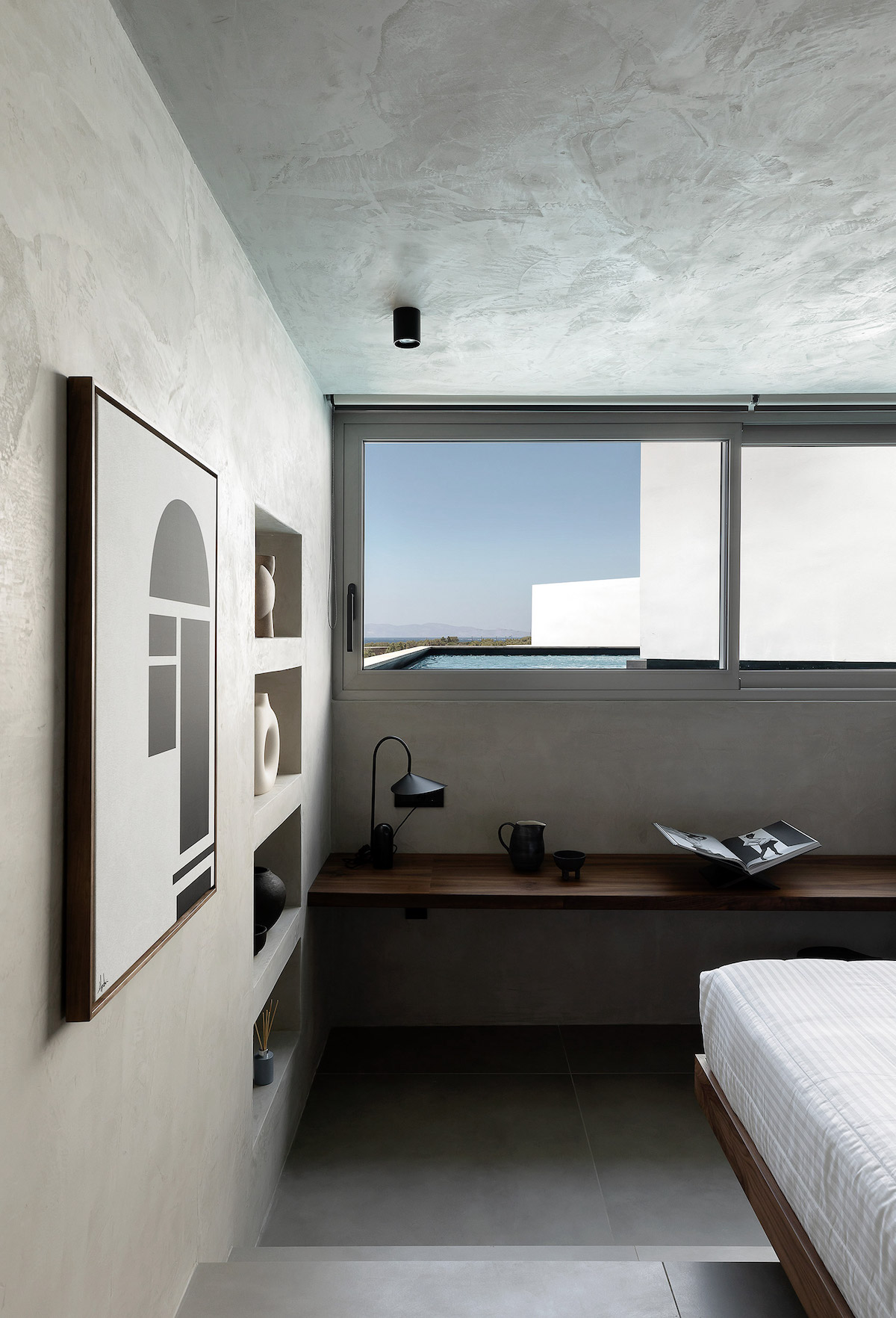 Bauhaus design scheme inside industrial guestroom