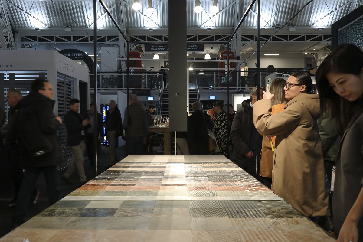 visitors at Surface Design Show exploring the Stone Tapestry
