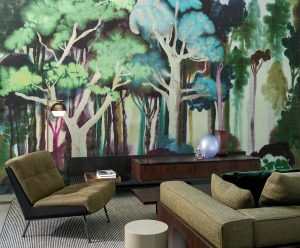 Banyan design in the Alaya collection from Arte-Wallcoverings in green in room with seating
