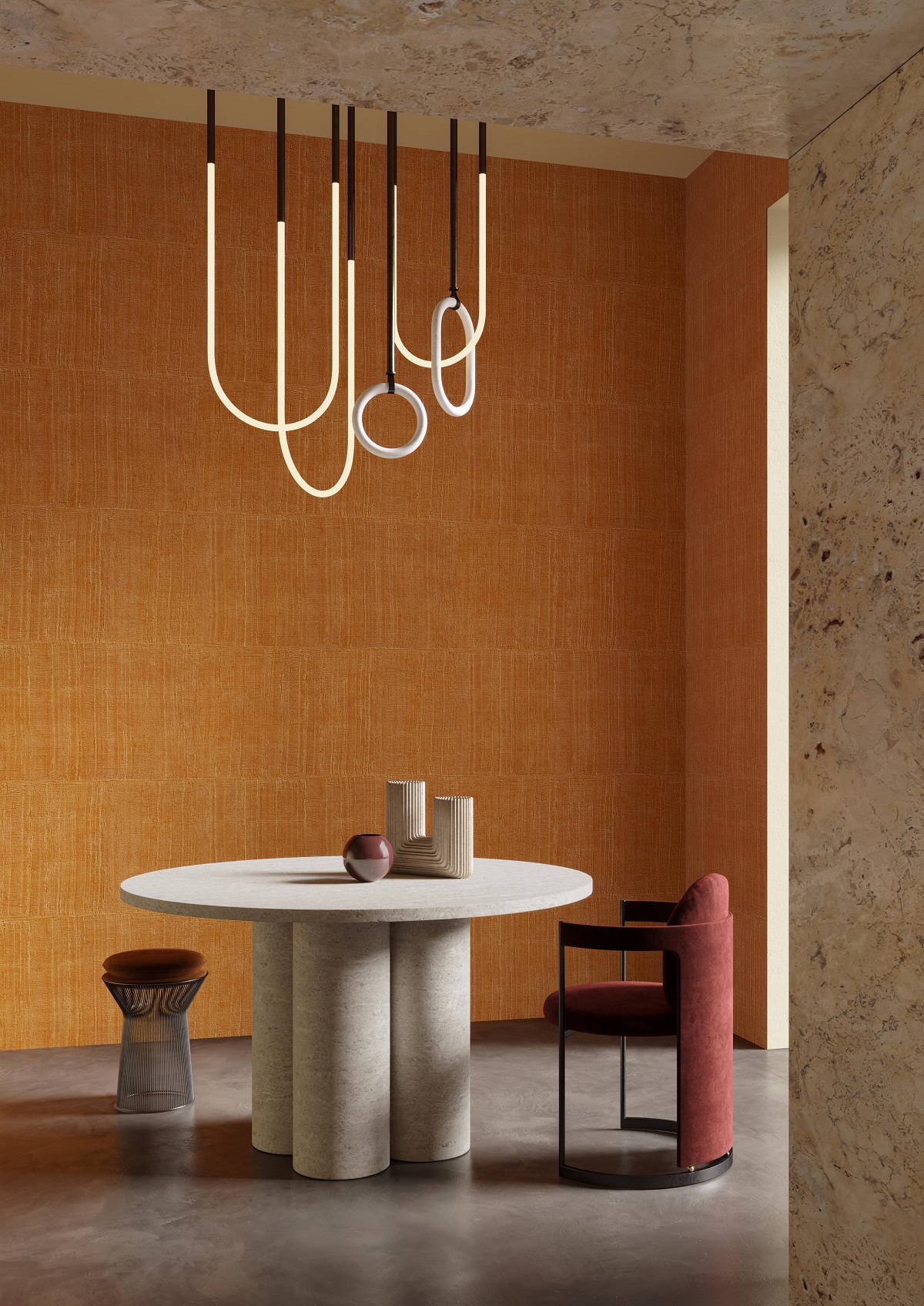 round table and statement lighting in front of Arte-Wallcoverings--Alaya_Katan in orange