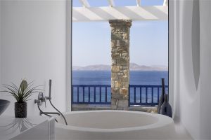 round bath with a sea view in the private villa at Mykonos Grand
