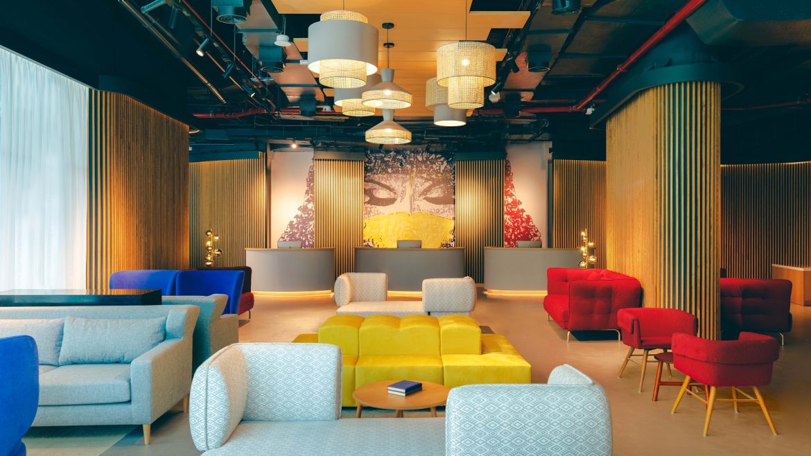 NH Collection dubai The Palm lobby with seating in primary colours