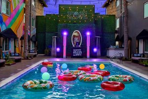 Fairylights, colourful inflatables and mural around the pool at Hotel ziggy