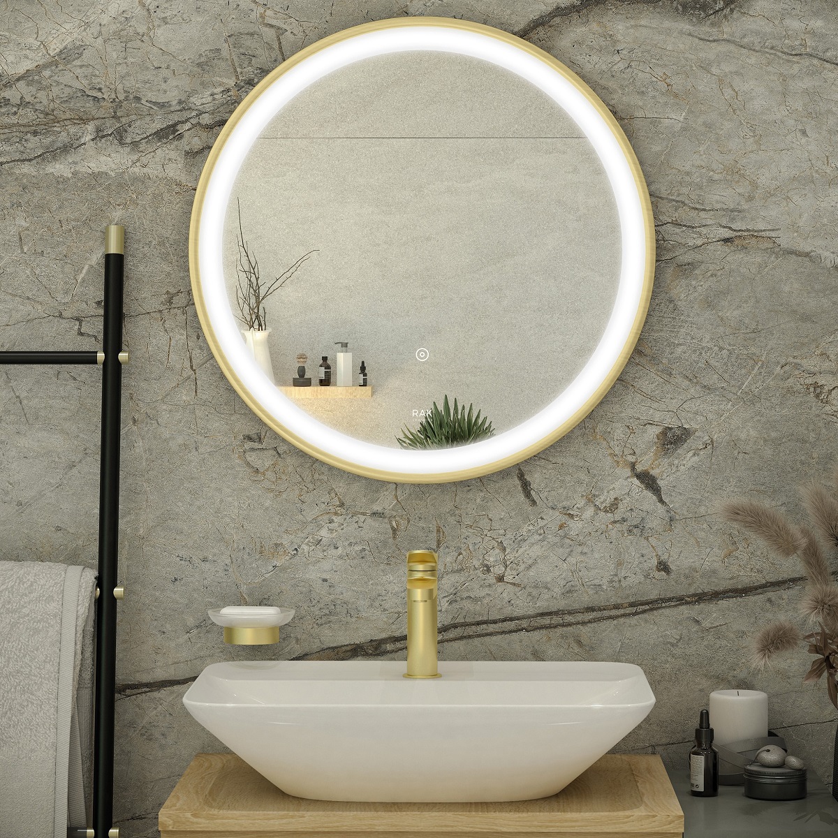 RAK round bathroom mirror on stone wall with a towel ladder
