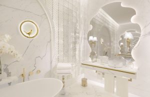 white, gold and marble in the bathroom at Raffles Doha