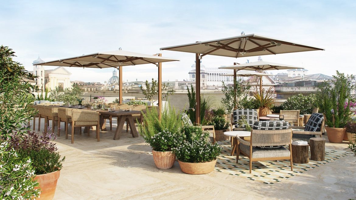 Umbrellas, seating and plants on the rooftop of Six Senses Rome overlooking the city