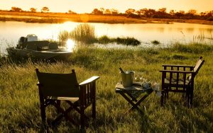 two deckchairs and sunset at Sitatunga Gret Plains okovango delta