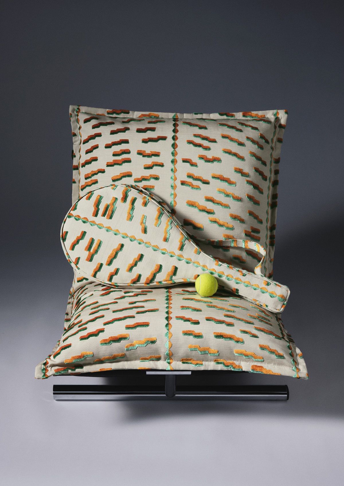 Dedar fabric covering cushions and racket