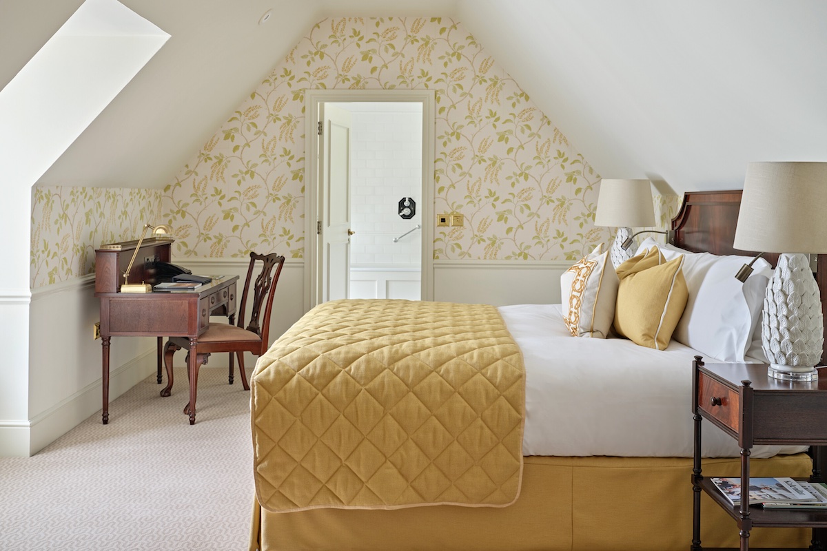 A side profile of yellow guestroom inside Ellenborough Park Hotel
