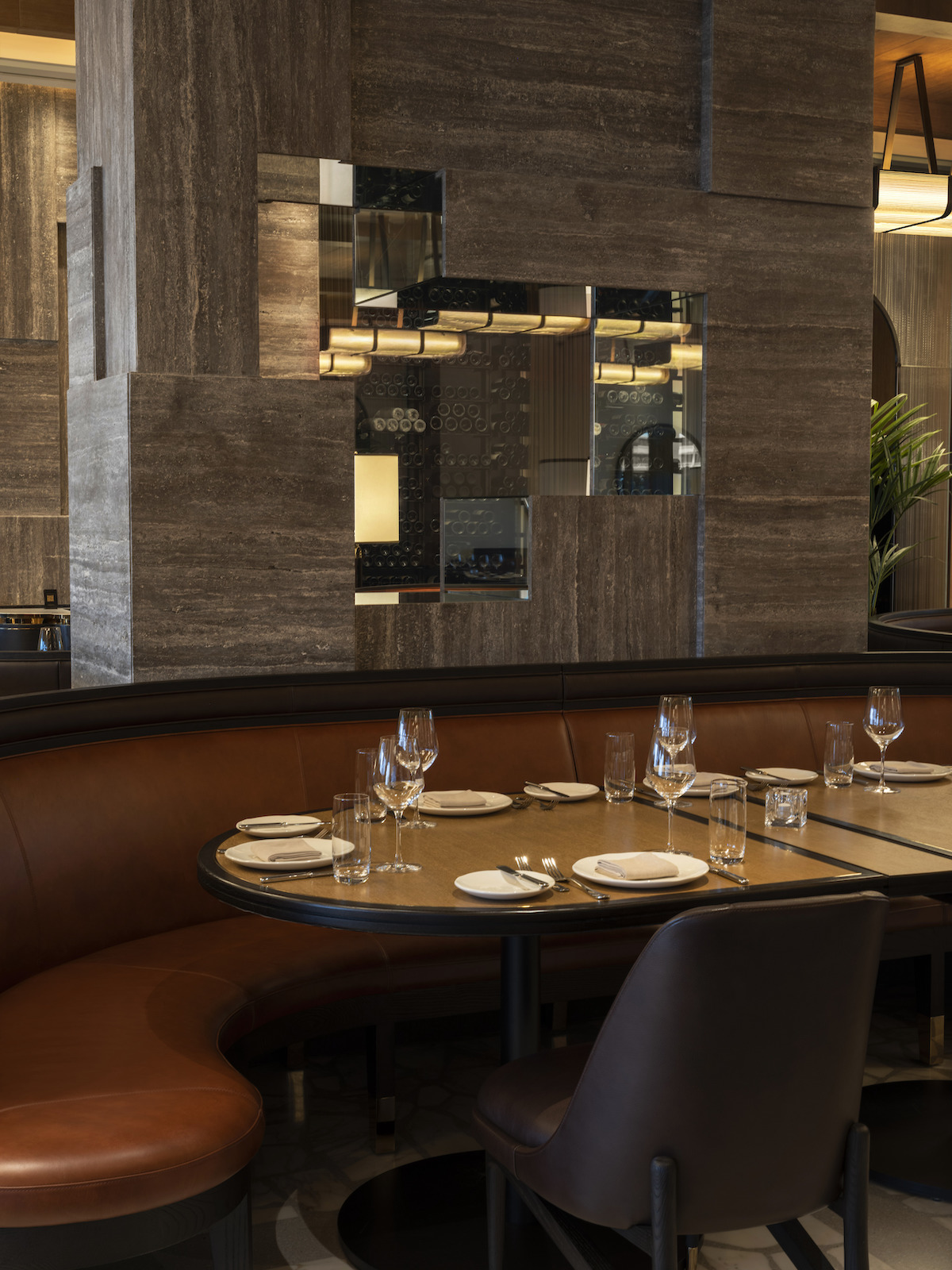 A dark, moody atmosphere in new restaurant at Waldrof Astoria Lusail in Doha