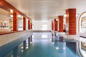 red tiles on the pillars around the indoor pool in the SPA at Faern Arosa