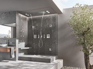 grey and concrete contemporary outdoor bathroom design with GROHE ceiling shower