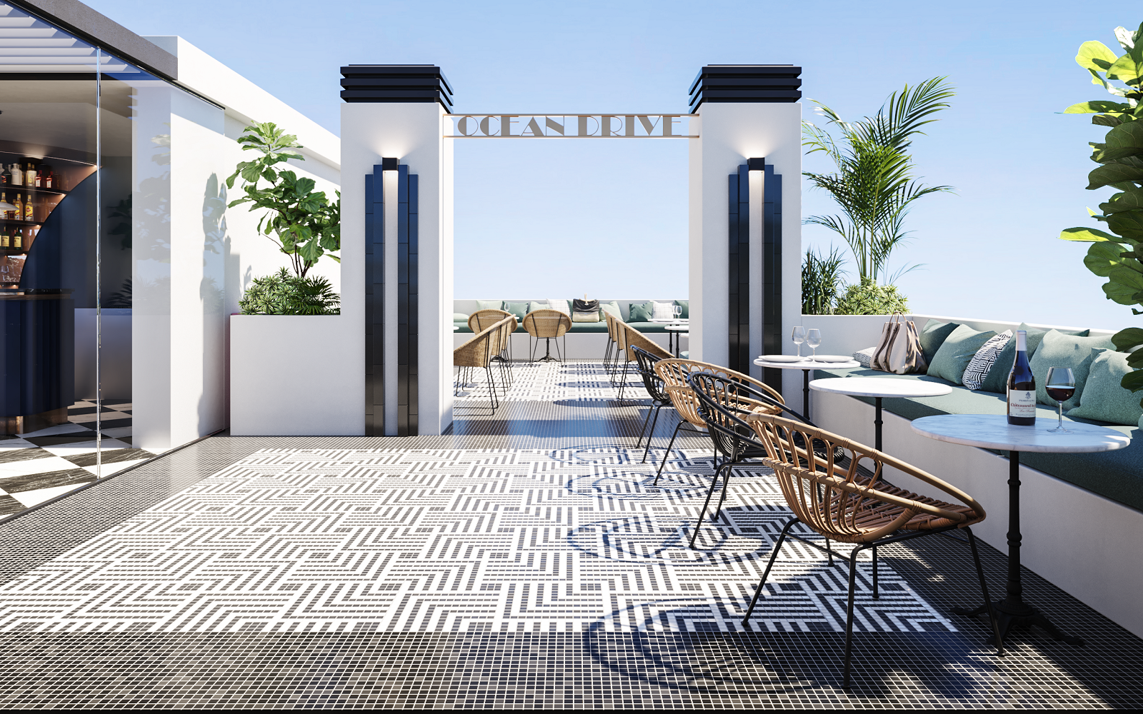 wicker chairs and tiled patterned floor at the art deco inspired entrance to Ocean Drive Ibiza
