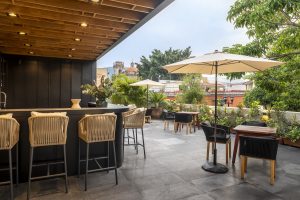 bar and terrace with umbrellas at Majagua