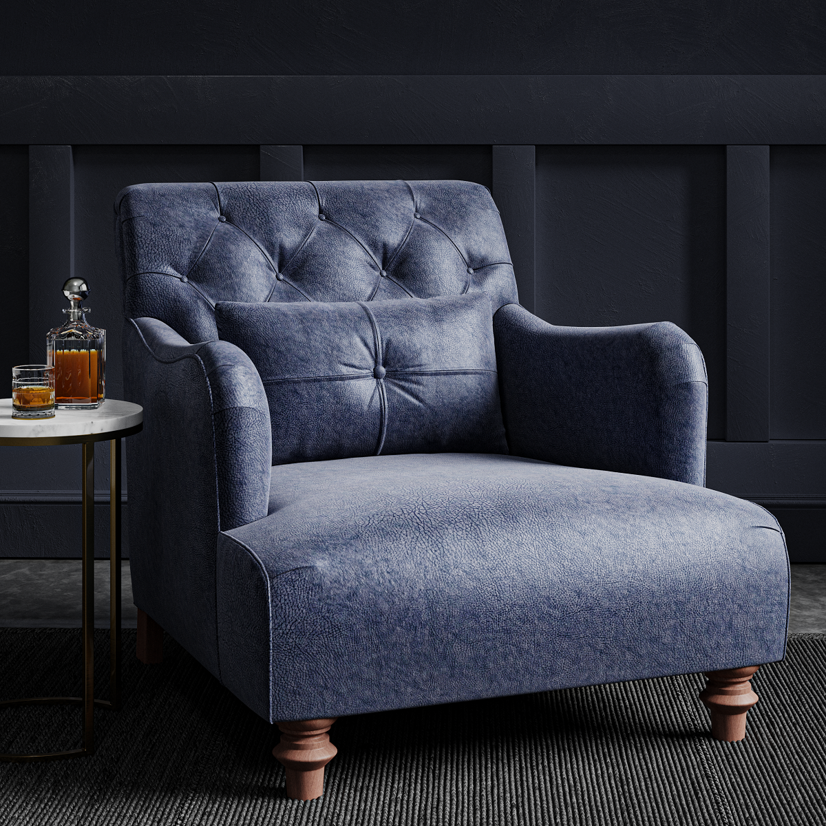 traditional blue deep buttoned chair in a study upholstered in Sekers Tribeca fabric