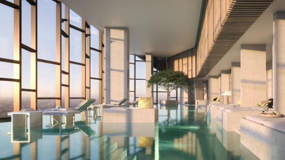 floor-to-ceiling windows with view across infinity pool in the spa looking over Melbourne