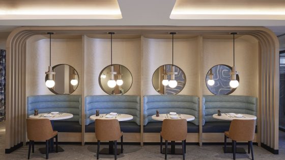 banquette and cubicle with seating and bespoke lighting in the Miami Marriott Biscayne Bay by HBA